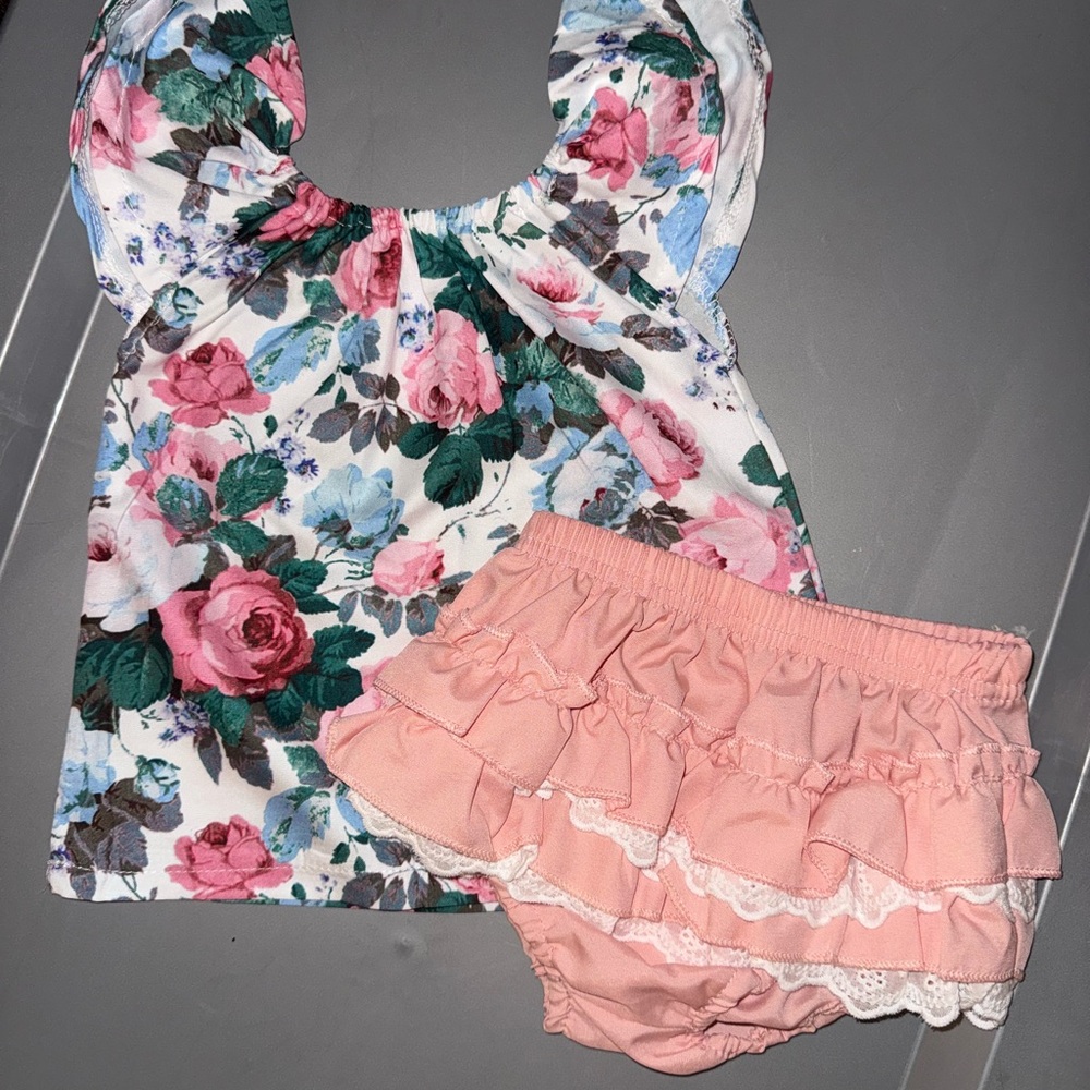 Boutique- Floral Print top with soft pink and lace ruffled bottoms. NWOT